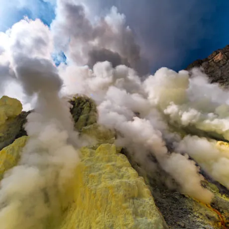 Toxic vappors of sulfur mining, Mount Ijen crater lake, East Java, Indonesia