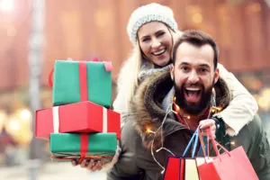 happy couple christmas shopping