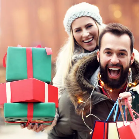 happy couple christmas shopping