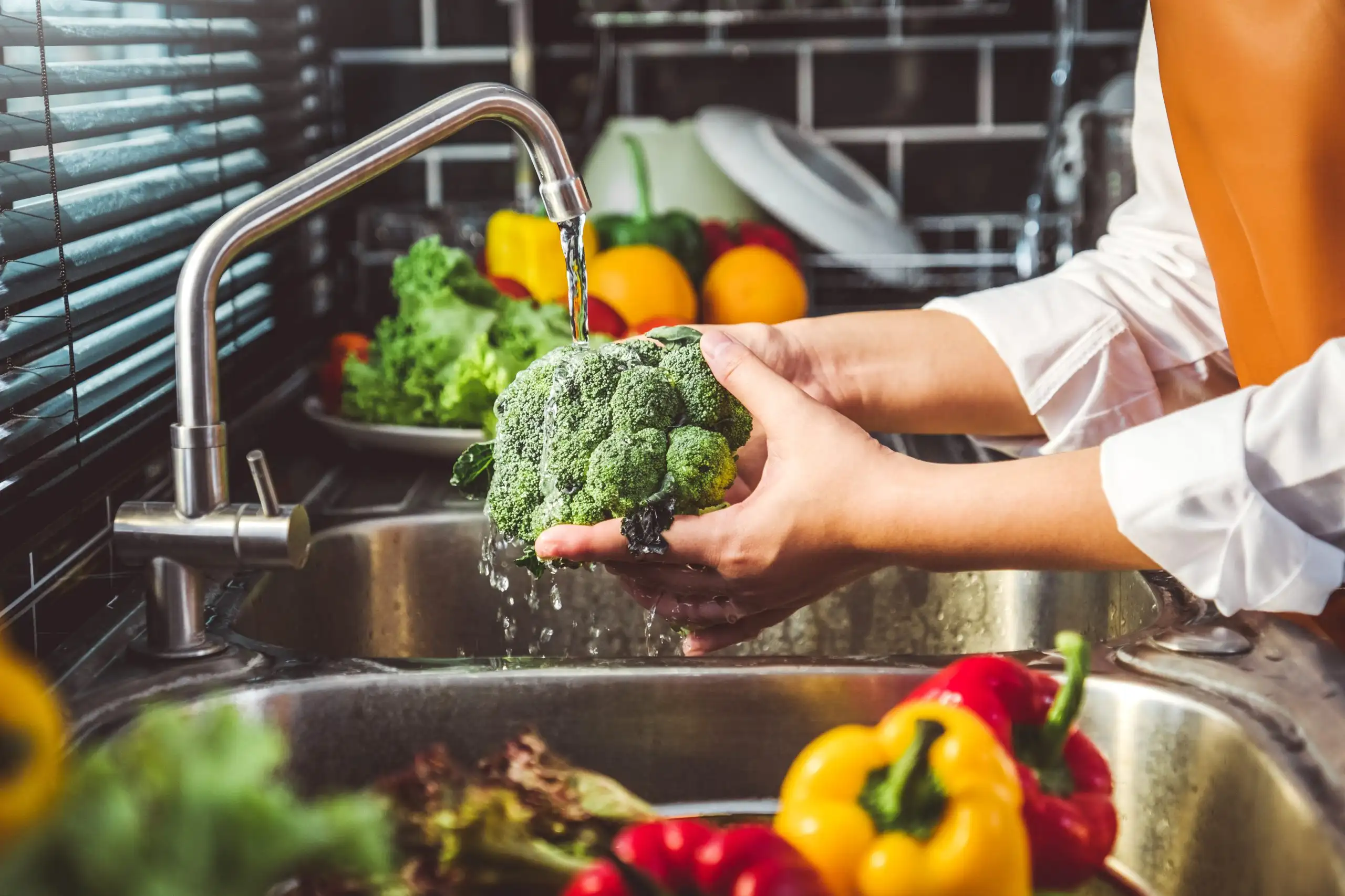 Hand washing tomato fresh vegetables preparation healthy