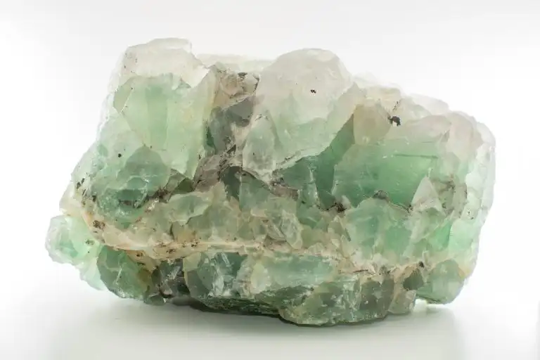 Green gemstone natural mineral fluoride or green beryl isolated